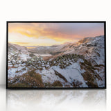 Large abstract wall art depicting the Cumbria landscape in England, with muted earth tones, framed in black acrylic.