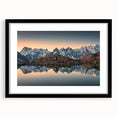 Colorful abstract art print of the French Alps in a black frame with mat, ideal for living room decor.
