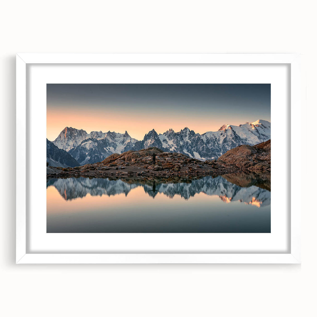 Textured art print of the French Alps in muted earth tones on a framed white canvas, suitable for bedroom decor.