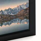 Black wall art featuring a textured depiction of the French Alps in vibrant, colorful art style on a framed canvas.