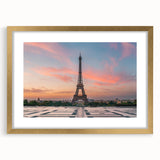 Abstract art print of Paris scenery in muted gold and blue tones, framed with a gold mat, suitable for dining room decor.