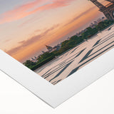 Art deco poster of a Parisian street scene in subdued earth tones on rolled canvas, suitable for dining room decor.