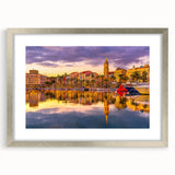 Extra large abstract art print depicting a textured European scenery in muted earth tones, framed in silver.