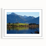 Textured abstract art print of a Bavarian landscape in muted earth tones, framed with a white mat.