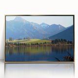 Art deco poster depicting a serene Bavarian landscape in muted earth tones, framed in gold acrylic.
