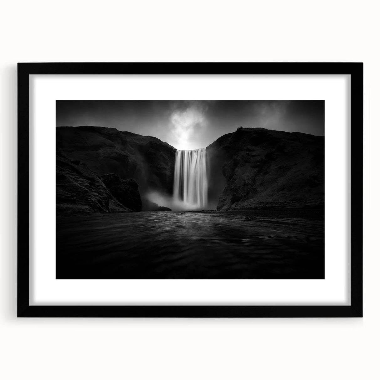 Extra large abstract art print of a colorful, textured Icelandic scenery on a black framed canvas.