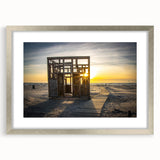 Extra large abstract art print featuring a textured scenery of Latvia in muted earth tones, framed in silver.