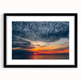 Abstract art print featuring vibrant, colorful textures of a European scenery on a large framed canvas.