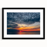 Abstract art print featuring vibrant, colorful textures of a European scenery on a large framed canvas.