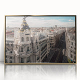 Large art print of Madrid scenery in mid-century modernist style, with gold frame, suited for modern decor.