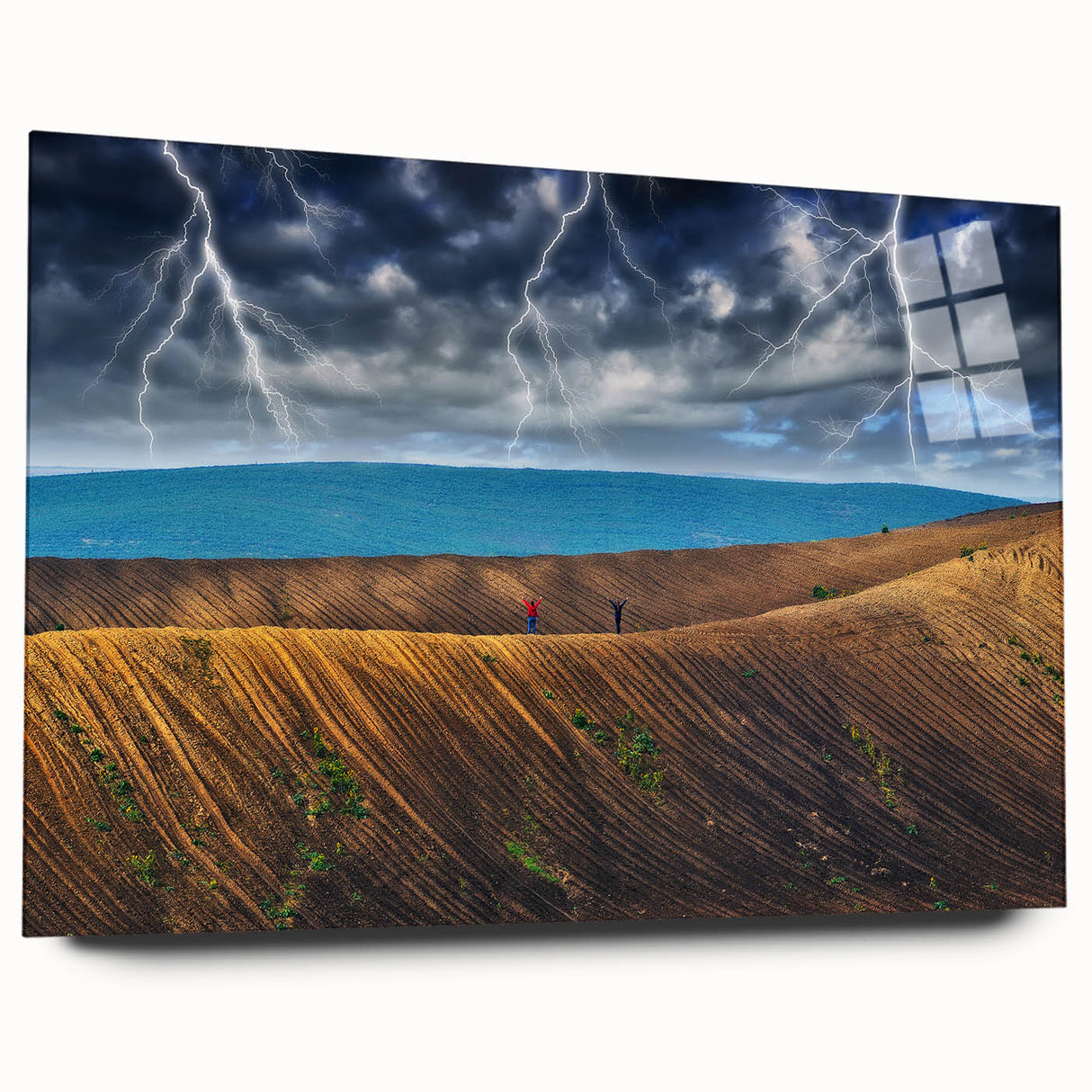 Large abstract wall art of a European scenery in muted green and blue tones on acrylic glass.