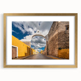 Abstract art print of Yucatan scenery in textured strokes on a large canvas, framed in gold, ideal for living room decor.