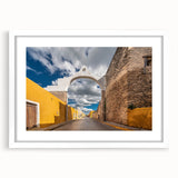 Abstract art print of Yucatan scenery in muted earth tones on a framed white mat, suitable for bedroom or dining room decor.