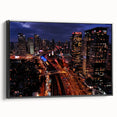 Black and white framed canvas of Tel Aviv landscape, ideal for bedroom wall art in a vintage poster style.