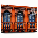 Acrylic print of a large abstract depiction of a Middle Eastern scenery, in muted earth tones.