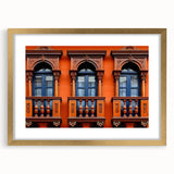 Extra large abstract art print of a textured Middle Eastern scenery in muted gold tones, framed with a mat.