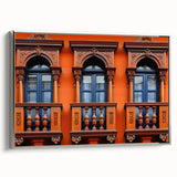 Framed canvas of a vintage-style landscape painting depicting a Saudi Arabian scene in colorful hues.