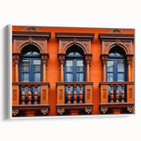 Vintage poster art of a Middle Eastern scenery in vibrant colors on a large framed canvas, ideal for living room decor.