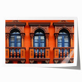 Extra large rolled print featuring Saudi Arabia scenery with floral accents in muted earth tones.