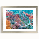 Textured abstract art print depicting a muted, earth-toned South American landscape, presented in a silver frame with mat.