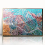 Mid-century modernist acrylic print of a South American landscape in warm earth tones, framed in gold.