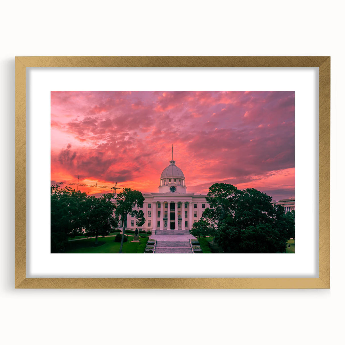 Extra large abstract art print depicting a textured Alabama scenery in muted earth tones, framed in gold.
