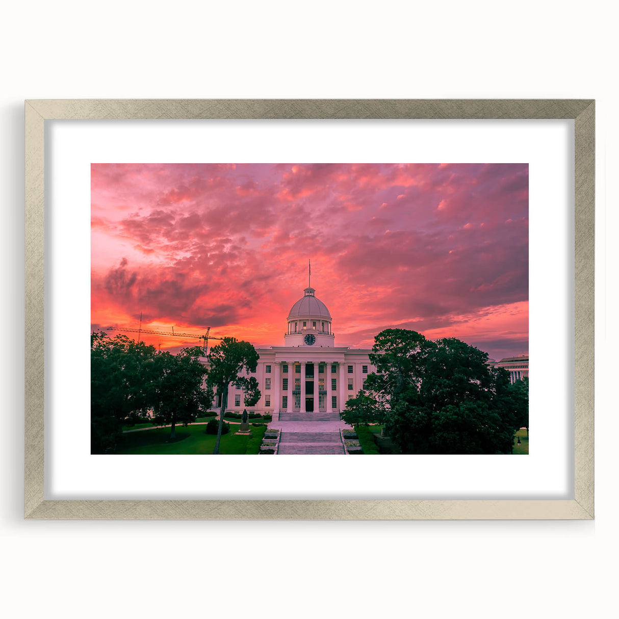 Abstract textured art print of Alabama scenery in muted earth tones, framed in silver, ideal for bedroom wall decor.