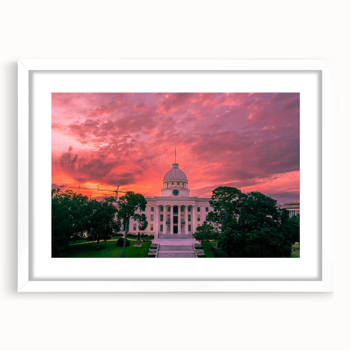 Abstract art print of Alabama scenery in muted earth tones on a white framed canvas, suitable for dining room decor.