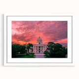 Abstract art print of Alabama scenery in muted earth tones on a white framed canvas, suitable for dining room decor.