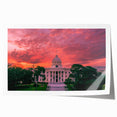 Rolled print of Alabama scenery with floral motifs in soft pastel colors, suitable for dining room or bathroom wall art.