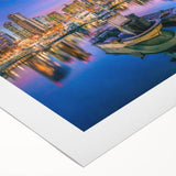 Art deco poster of San Diego skyline in muted blue tones on rolled canvas, suitable for dining room wall art.