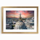 Extra large abstract art print of San Francisco skyline in muted gray and gold tones, framed in gold.