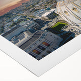 Art deco poster featuring the San Francisco skyline in muted gray and blue tones on rolled canvas.