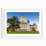 Abstract art print of Connecticut scenery in muted green and blue tones on a framed white matte canvas.