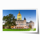 Connecticut scenery with floral elements in soft green and blue tones on a large rolled canvas.