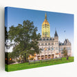 Large art depicting a serene Connecticut landscape in muted green and blue tones on stretched canvas.