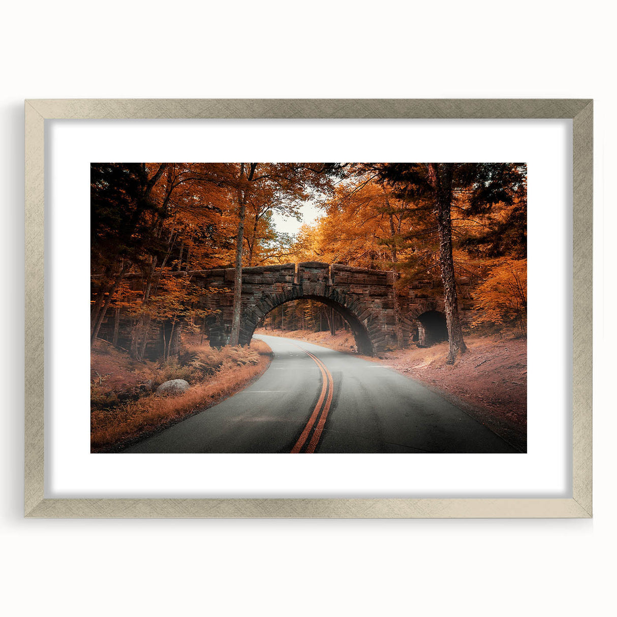Textured abstract art print depicting Acadia's rugged coast in muted earth tones, framed in silver, ideal for bedroom art.