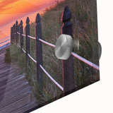 Large abstract wall art depicting a Maine coastline in muted blue and gray tones on acrylic glass.