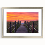 Textured art depicting an abstract Maine coastline in muted blue and gray tones on a framed silver mat.