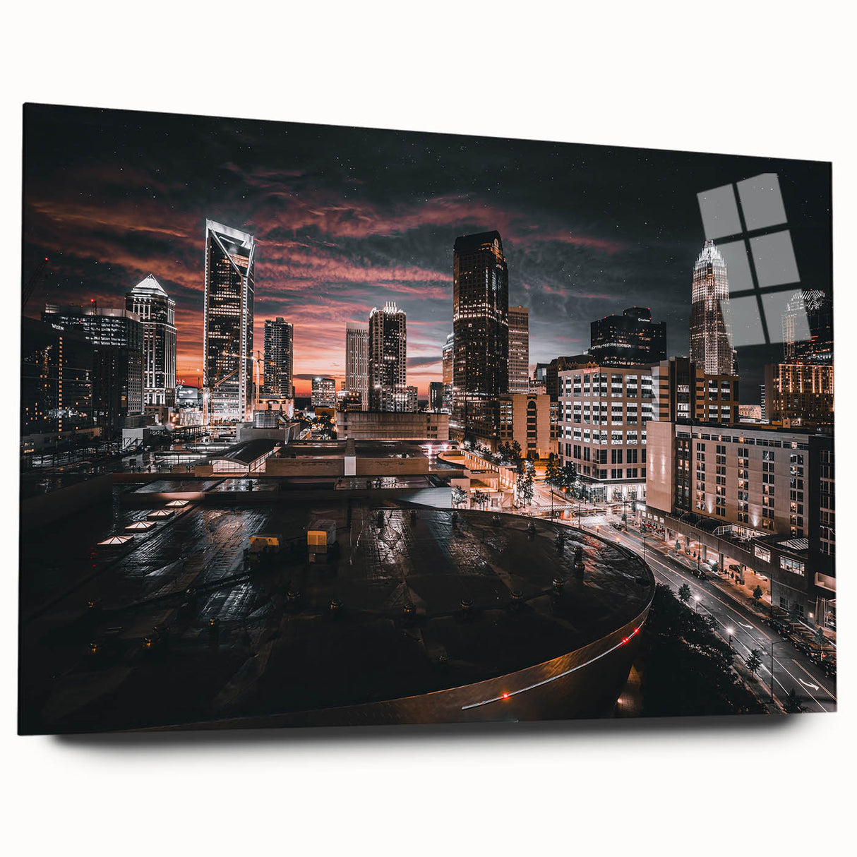 Large abstract depiction of the Charlotte skyline in muted gray and blue tones on acrylic glass.