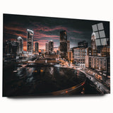 Large abstract depiction of the Charlotte skyline in muted gray and blue tones on acrylic glass.