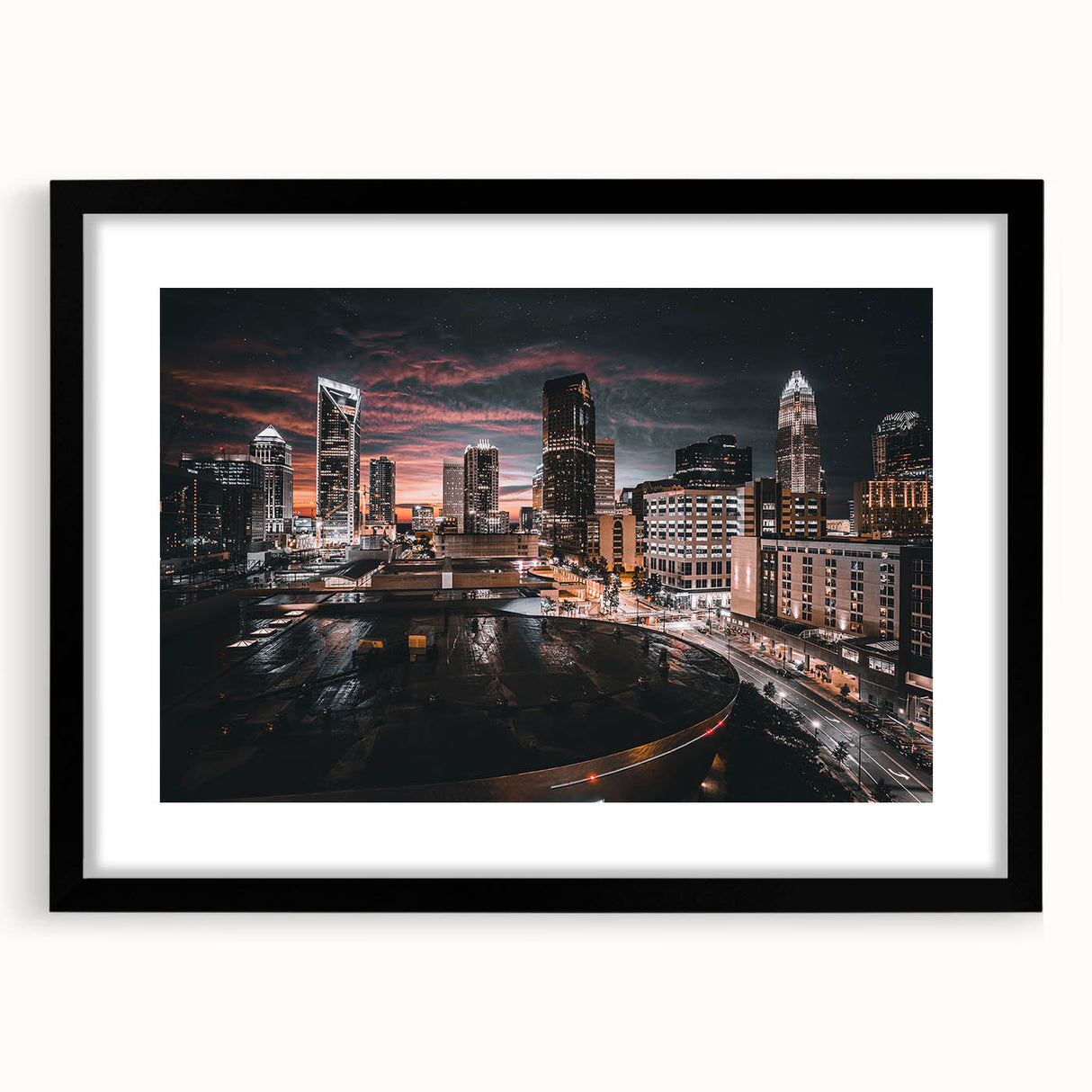 Abstract art print of Charlotte skyline featuring vibrant, colorful tones on a textured, large canvas.