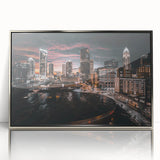 Mid-century modernist art depicting the Charlotte skyline in muted blue and silver tones on a framed acrylic print.