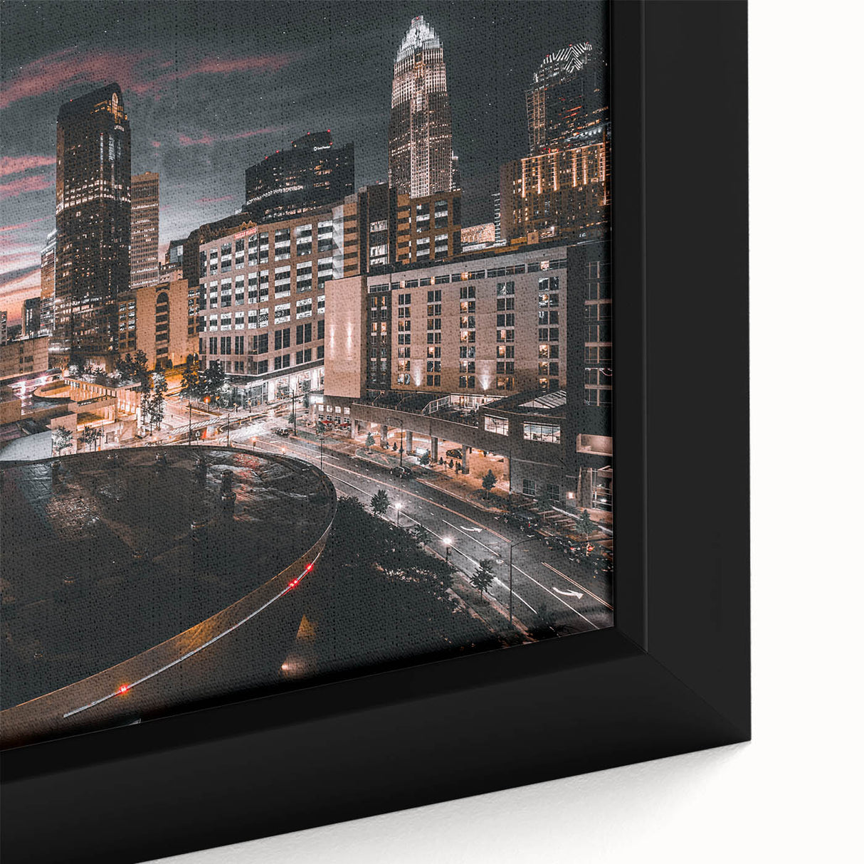 Textured black wall art of Charlotte skyline with colorful accents on a large framed canvas, suitable for living room decor.
