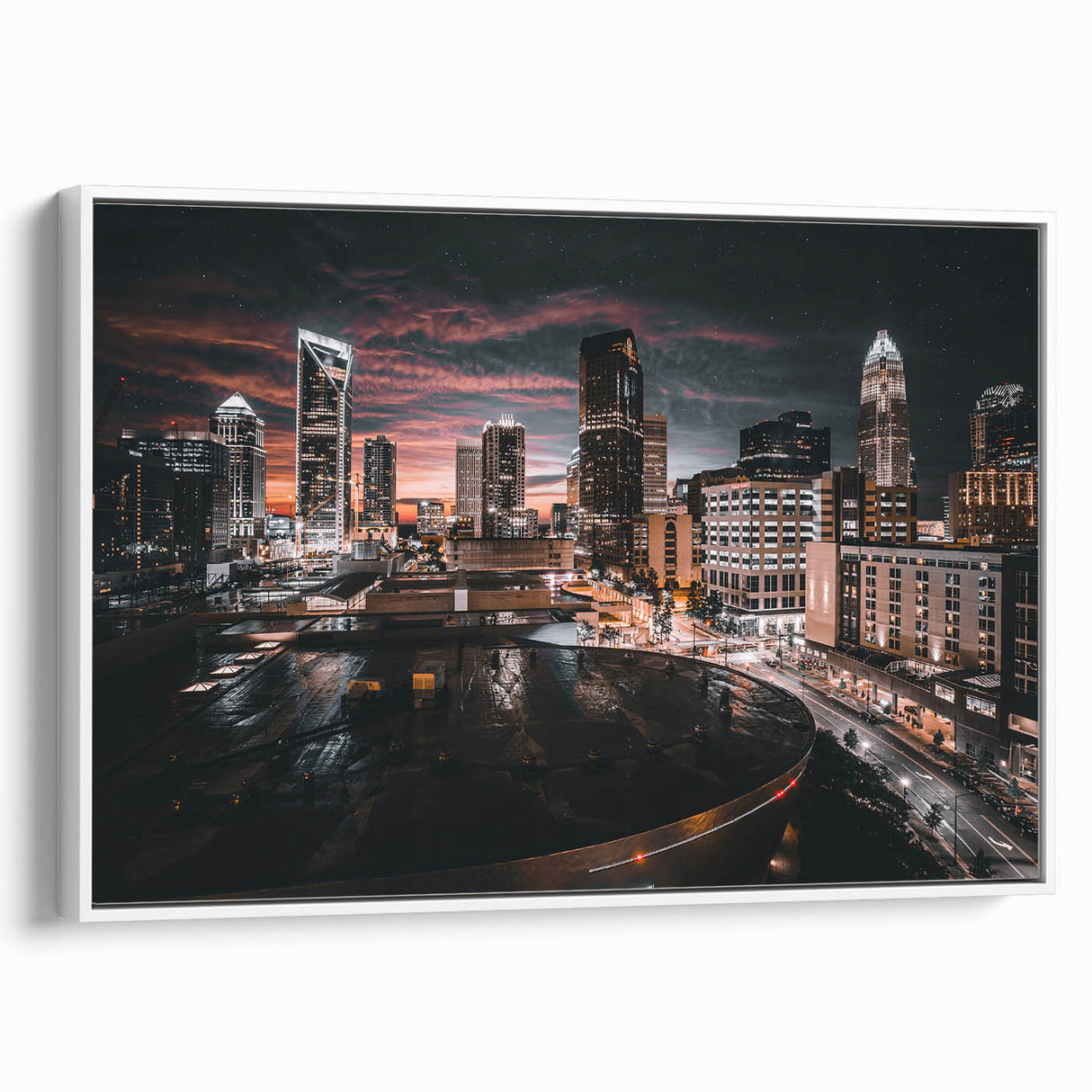 Vintage poster art of Charlotte skyline in vibrant colors on a large framed canvas, ideal for living room decor.