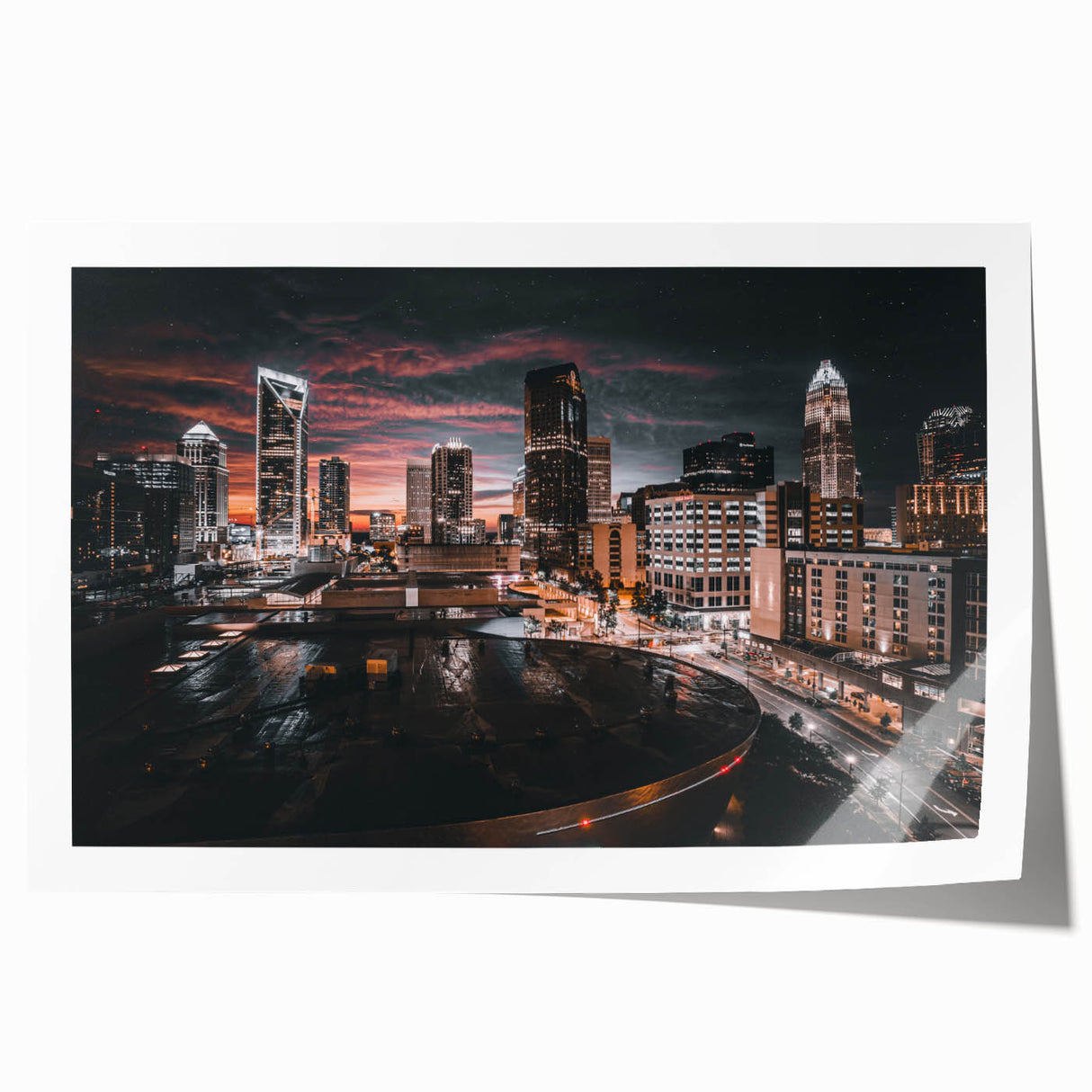 Rolled print of Charlotte, North Carolina skyline in muted blue and gray tones, suitable for art wall dining room.