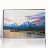 Acrylic print of the Grand Tetons in muted earth tones, framed in white, suitable as modern art wall decor for a nursery.
