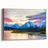 Framed canvas of a vintage-style landscape painting depicting the Grand Tetons, with a black and gold color palette.