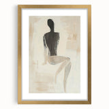 Abstract gold-framed artwork depicting a figurative design, featuring a mat border, showcased from the front view against a neutral backdrop. Perfect for modern home decor.