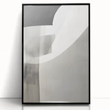 Framed abstract minimalist wall art featuring a sleek black acrylic design, showcasing geometric patterns and a modern aesthetic, perfect for contemporary home decor.